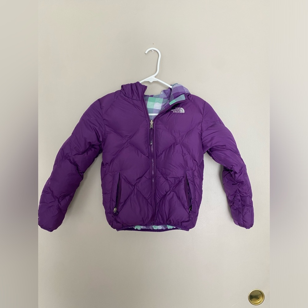 The north face jacket. color purple, kids small